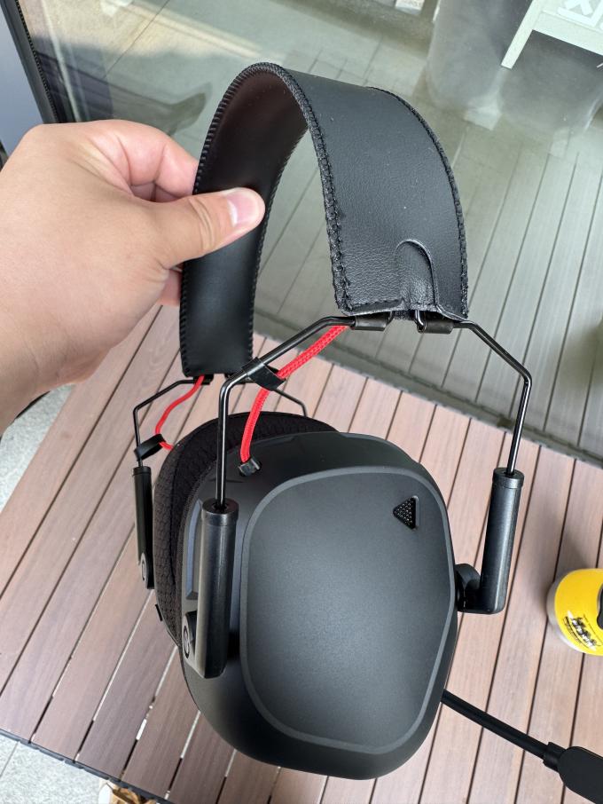 X1 PRO gaming headset with microphone attached