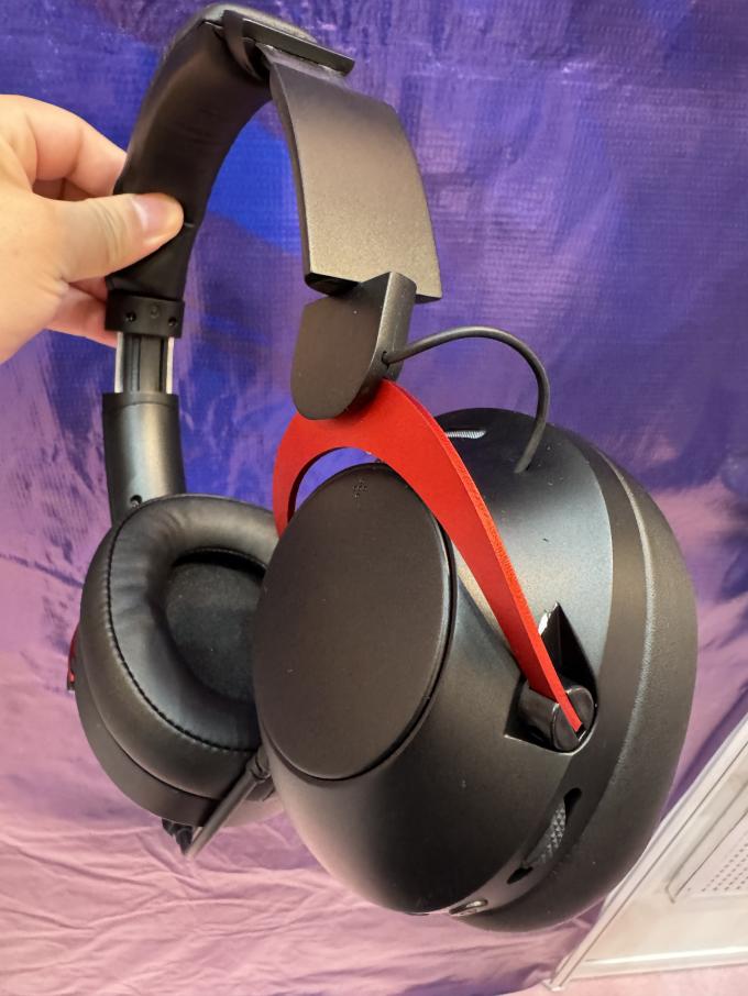 Side view of X1 PRO gaming headset highlighting controls and connectivity